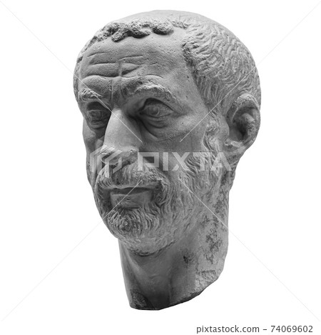 Head detail of the ancient man sculpture. Stone face isolated on white background. Antique marble statue of mythical character Head detail of the ancient man sculpture. Stone face isolated on white background. Antique marble statue of mythical character 74069602