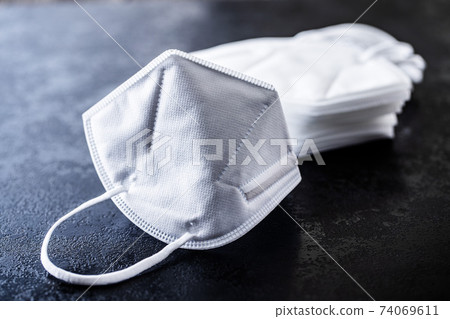 KN95 face mask. FFP2 mask as covid-19 protection. Coronavirus mask 74069611