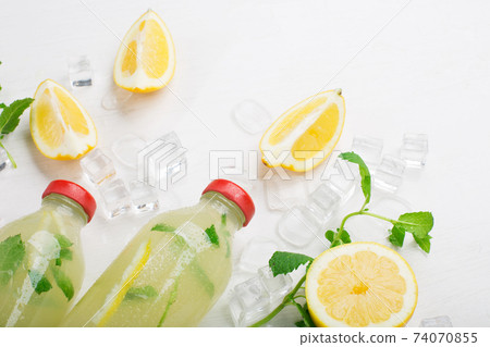Homemade lemonade with fresh lemon and mint Homemade lemonade with fresh lemon and mint 74070855