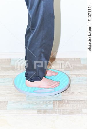 Boy on the balance board 74071114