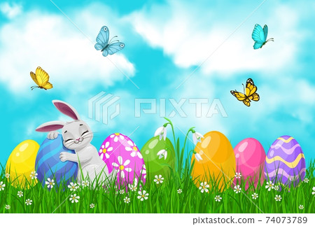 Easter egg hunt bunny or rabbit on spring grass 74073789