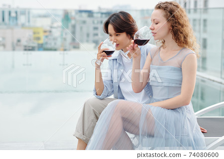 Girlfriends having romantic date 74080600