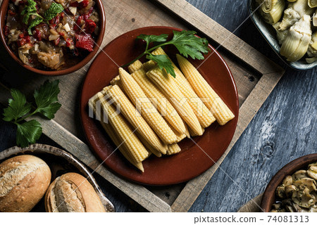 baby corns, escalivada, artichokes and mushrooms baby corns, escalivada, artichokes and mushrooms 74081313