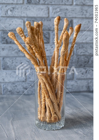 Bread sticks with sesame seeds. Selective focus Bread sticks with sesame seeds. Selective focus 74081965