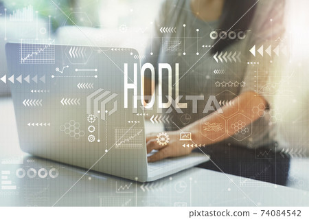 Hodl with woman using laptop Hodl with woman using laptop 74084542