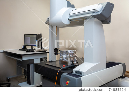 The coordinate measuring machine measures the aluminum part turned by the cnc machine 74085234