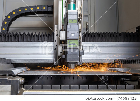 Programmable machine for laser cutting of metal. Sparks from laser cutting, Programmable machine for laser cutting of metal. Sparks from laser cutting, 74085422