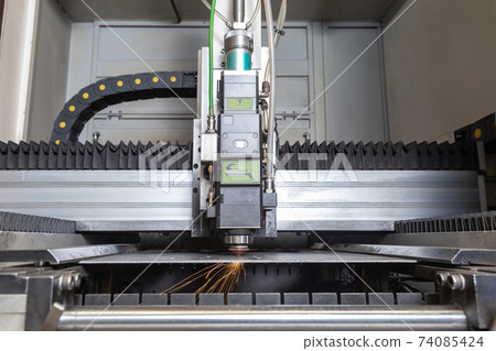 Programmable machine for laser cutting of metal. Sparks from laser cutting, Programmable machine for laser cutting of metal. Sparks from laser cutting, 74085424