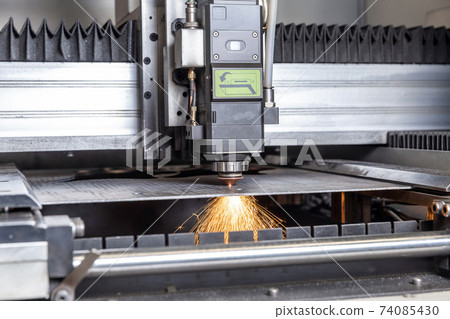 Programmable machine for laser cutting of metal. Sparks from laser cutting, Programmable machine for laser cutting of metal. Sparks from laser cutting, 74085430