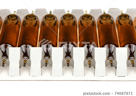 Ampoules isolated on white. Ampoules isolated on white. 74087871