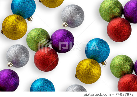 Christmas balls isolated on white background. Several christmas balls close-up on a white background. 74087972