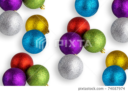 Christmas balls isolated on white background. Several christmas balls close-up on a white background. Christmas balls isolated on white background. Several christmas balls close-up on a white background. 74087974