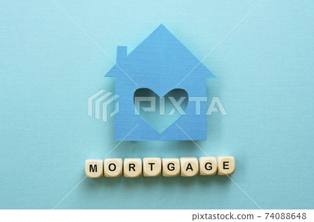 Mortgage word concept blue background Mortgage word concept blue background 74088648
