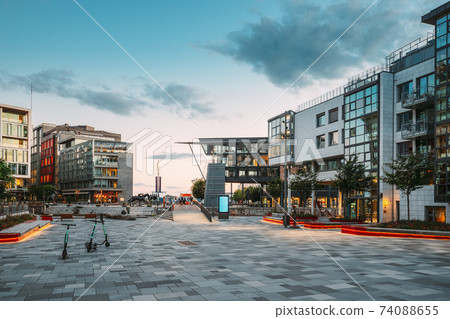 Oslo, Norway. Residential Multi-storey Houses In Aker Brygge District In Summer Evening. Famous And Popular Place. Oslo, Norway. Residential Multi-storey Houses In Aker Brygge District In Summer Evening. Famous And Popular Place. 74088655