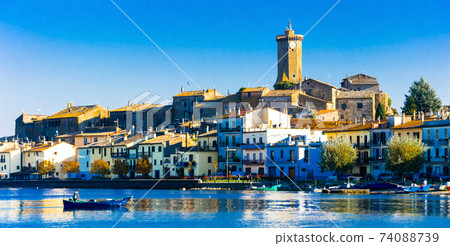 Beautiful tranquil scenery of Lago di Bolsena, Marta. Italy 74088739
