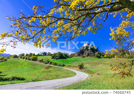 Scenic countryside in autumn colors -view of Castello di Bardi in Emiglia Romagna, Italy 74088745