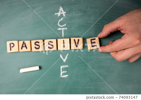 Passive and Active. Text from letters of the wooden alphabet 74093147