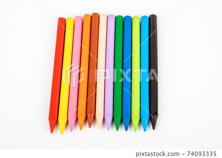 Colored wax crayons on a white background. Education and the creative process concept Colored wax crayons on a white background. Education and the creative process concept 74093335
