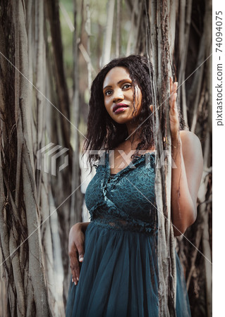 Happiest outside in the garden, carefree young black woman Happiest outside in the garden, carefree young black woman 74094075