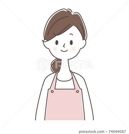 A woman in an apron smiles 74094087