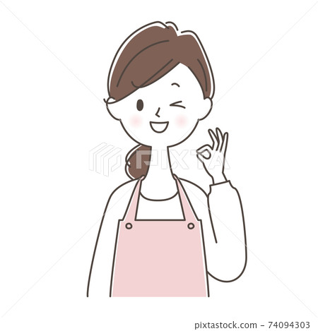 Female wink in an apron OK pose 74094303