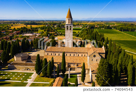Aerial view of Aquileia with Basilica di Santa Maria Assunta Aerial view of Aquileia with Basilica di Santa Maria Assunta 74094543