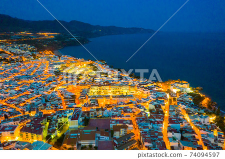 Illuminated view of coastal city of Nerja Illuminated view of coastal city of Nerja 74094597