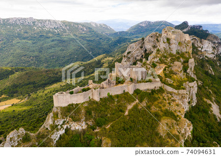 Aerial view of Castle ruin Peyrepertuse in the Aude in France Aerial view of Castle ruin Peyrepertuse in the Aude in France 74094631