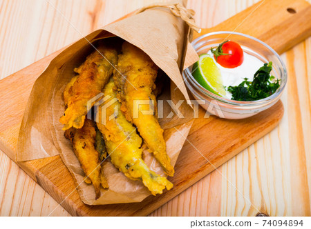 Batter-fried Sardines with cream-cheese sauce 74094894