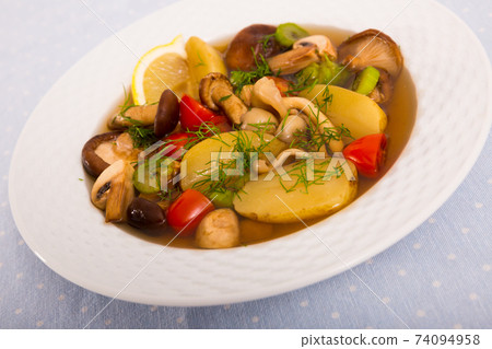 Plate with rustic soup 74094958