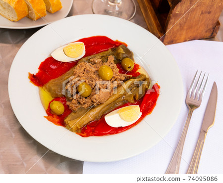 Escalivada - traditional Catalan dish of smoky grilled vegetables with tuna, egg and olives Escalivada - traditional Catalan dish of smoky grilled vegetables with tuna, egg and olives 74095086