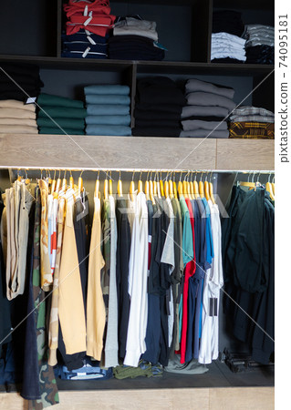 Casual men clothes in apparel store Casual men clothes in apparel store 74095181