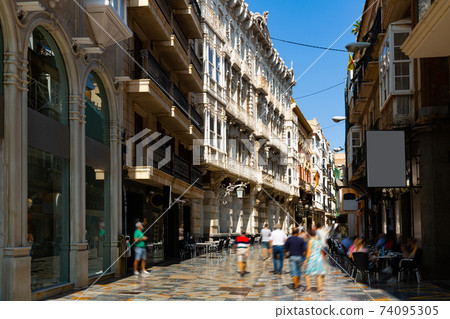 Typical pedestrian street of Cartagena city on summer day, Spain Typical pedestrian street of Cartagena city on summer day, Spain 74095305