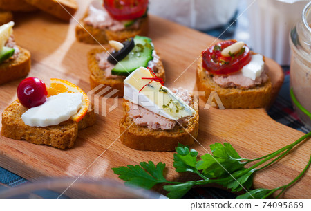 Canape with cheese, pate and vegetables Canape with cheese, pate and vegetables 74095869