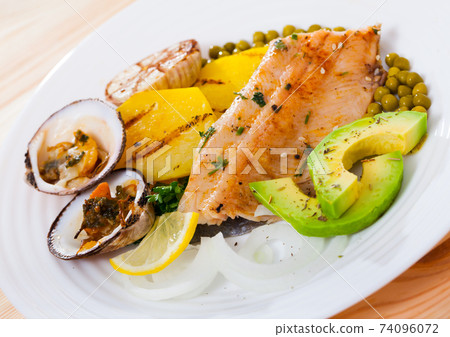 Grilled trout with vegetables and clams Grilled trout with vegetables and clams 74096072