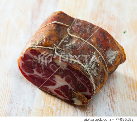 Piece of cured pork tenderloin 74096192