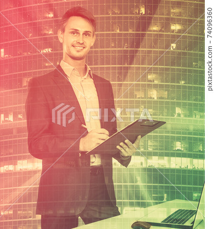 Successful businessman signing document 74096360