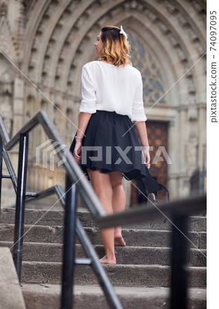 female going back barefoot the stone stairs female going back barefoot the stone stairs 74097095