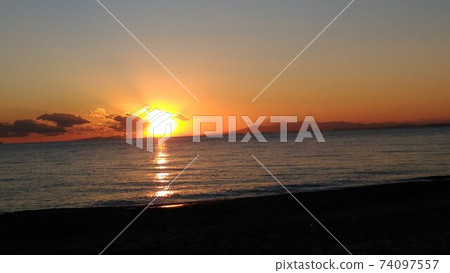Mt. Fuji and the setting sun across Tokyo Bay Mt. Fuji and the setting sun across Tokyo Bay 74097557