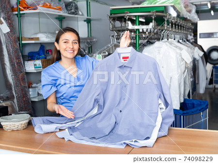 Portrait of woman worker of dry-cleaning facility 74098229