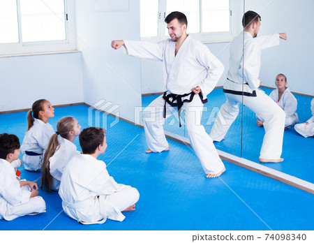 Man training new karate moves Man training new karate moves 74098340