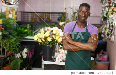 Confident owner of floral store Confident owner of floral store 74099981