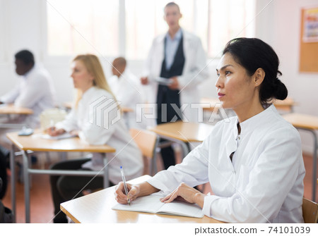 Group of medical academy students at lesson Group of medical academy students at lesson 74101039