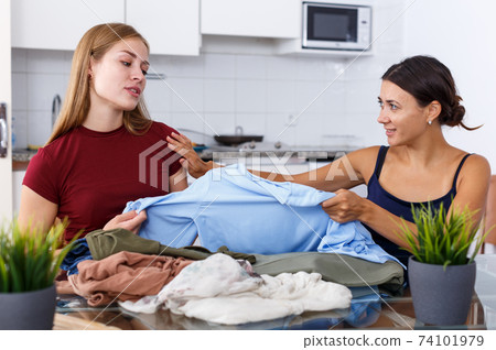 Girls fighting for one clothes Girls fighting for one clothes 74101979