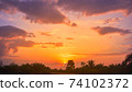 Beatiful sunset with cloudy.Horizontal dusk landscape.Nature landscape with clouds background 74102372