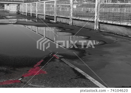 Fence and puddle 74104620