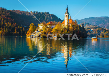 Famous church on the small island and lake Bled, Slovenia 74105452