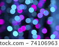 Abstract blue bokeh texture on black background 74106963