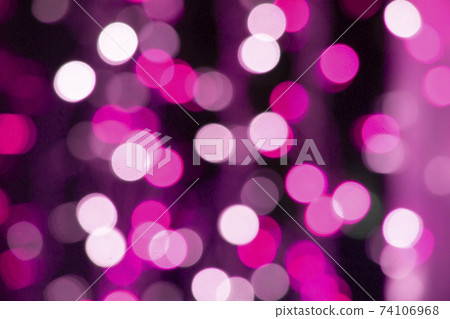 Abstract pink bokeh texture on black background 74106968