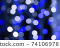Abstract blue bokeh texture on black background 74106978